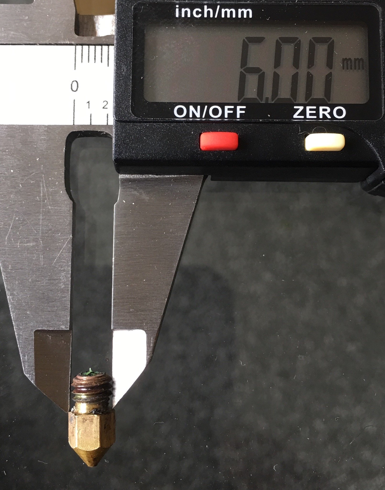 Measurement of nozzle in digital calipers